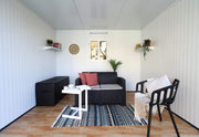 The Duramax insulated glass building 10x10 transformed to a living room.