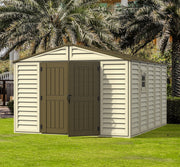 Duramax Woodbridge Plus 10.5'x13' shed standing in a suburban backyard, surrounded by palm trees, perfect for storing gardening equipment and outdoor gear.