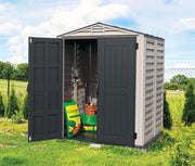View of Duramax YardMate Plus 5'x5' Shed positioned on grass with open doors revealing stored garden tools.
