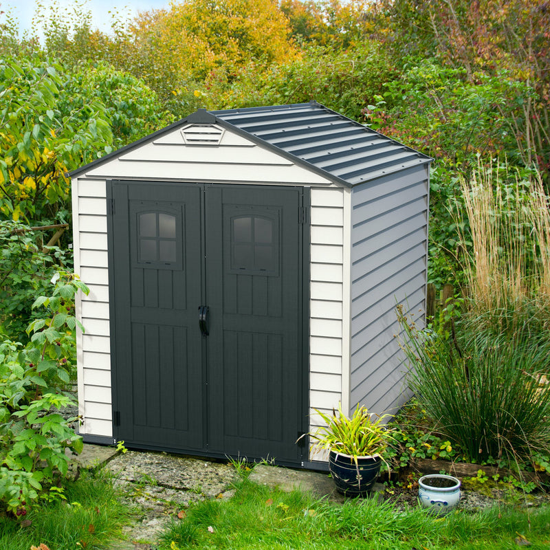 Duramax 7x7 StoreMax Plus w/molded floor - Backyard Oasis  placed in the garden