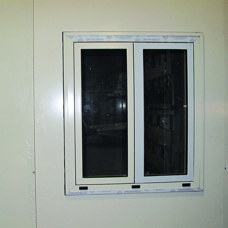 Duramax Flat Roof Building 19x10 - Backyard Oasis closed window view from inside