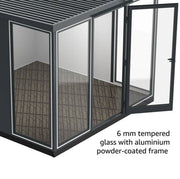 View of the inside of an empty Duramax Insulated Glass Building 10x10 featuring its tempered glass.