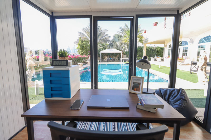 Duramax insulated building office setup back view office seat view from inside; by poolside