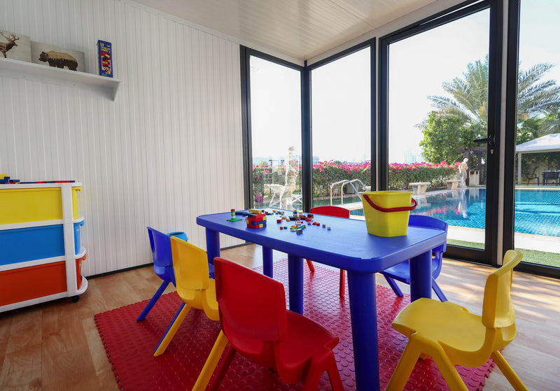 Inside view of the Duramax Insulated Glass Room transformed as kids play area.