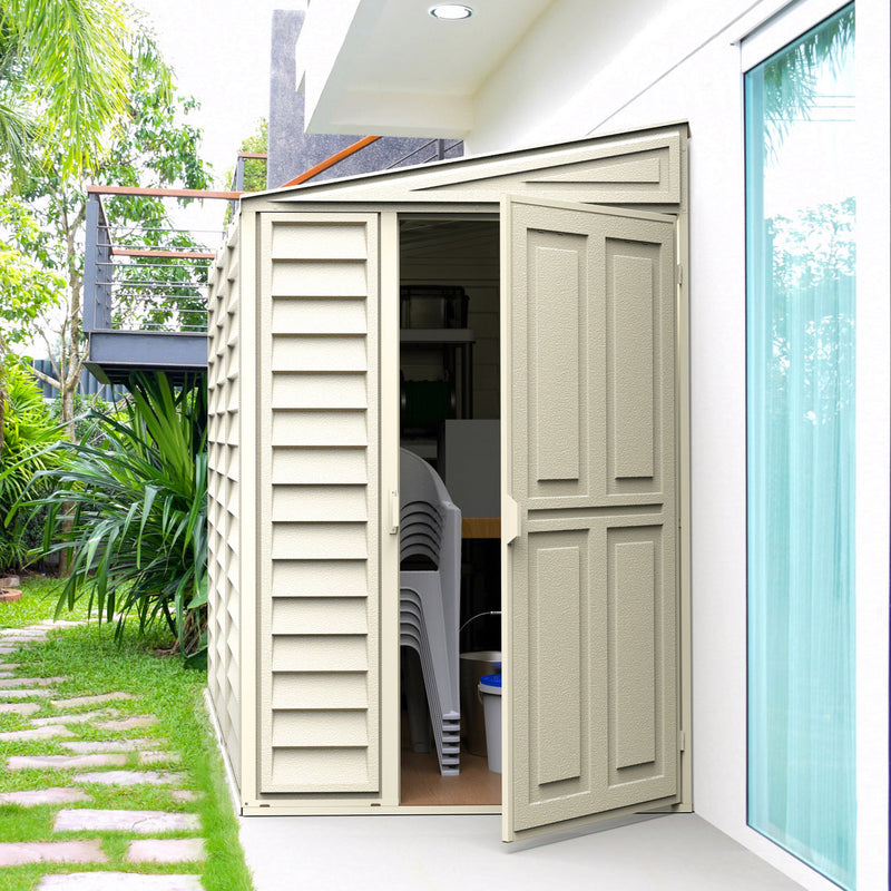 Duramax SideMate Shed w/ Foundation 4x8 - Backyard Oasis slightly opened door; things inside