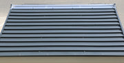 The Duramax StoreMax Plus 10.5 X 8 - 30225 roof of a house with a metal soffit. roof detail close up