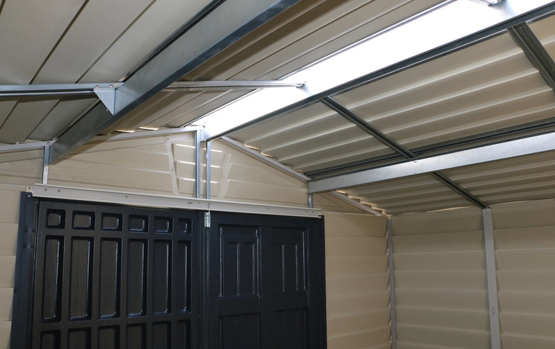 A Duramax StoreMax Plus 10.5 X 8 - 30225 metal shed with a door and a skylight. roof support details from inside