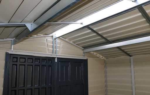 A Duramax StoreMax Plus 10.5 X 8 - 30225 metal shed with a door and a skylight. roof support details from inside
