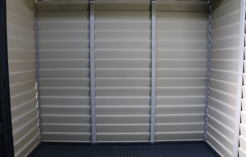 The inside of a Duramax StoreMax Plus 10.5 X 8 - 30225 storage shed with a door. wall details
