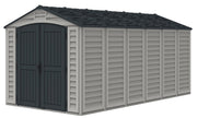 Front view of a durable Duramax Apex Pro 15'x8' storage shed in gray, showcasing robust design with decorative trim and functional windows, ideal for secure storage needs.