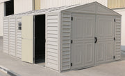 Duramax 10 ft Outdoor Vinyl Garage with closed doors, featuring a robust and stylish design, perfect for secure and aesthetic backyard storage solutions.