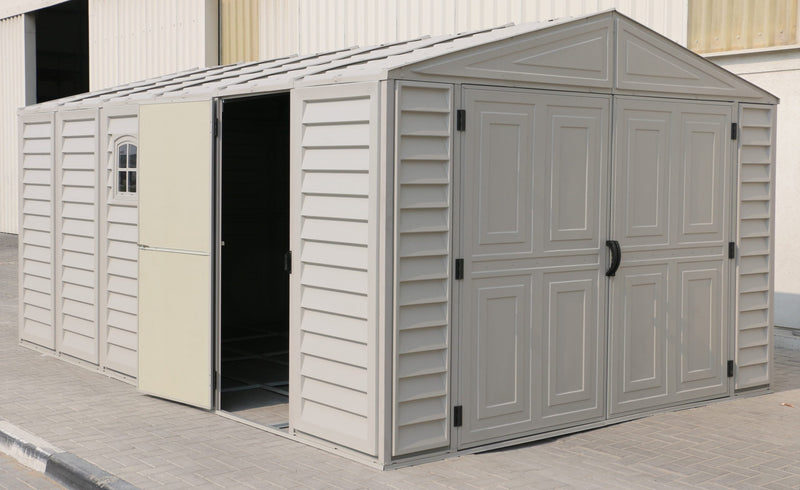 Duramax 10 ft Outdoor Vinyl Garage with closed doors, featuring a robust and stylish design, perfect for secure and aesthetic backyard storage solutions.