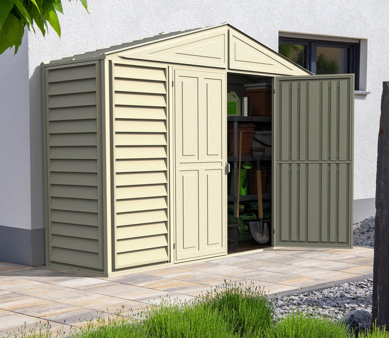 Duramax Sidepro 10.5'x3' storage shed in an outdoor setting with one door open, revealing interior storage space filled with garden tools and equipment.