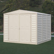 Duramax Duramate 8'x8' Vinyl Storage Shed beautifully integrated in a natural forest setting, highlighting its versatility and aesthetic appeal.