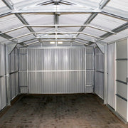 Inside view of an empty Duramax Imperial 12'x20' metal garage, emphasizing the interior space and metal shelving.